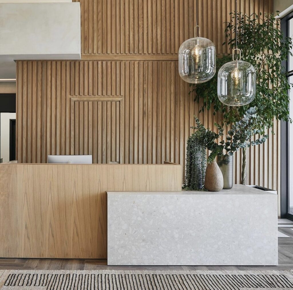 Neolith Retrostone reception desk with a terrazzo-inspired design.