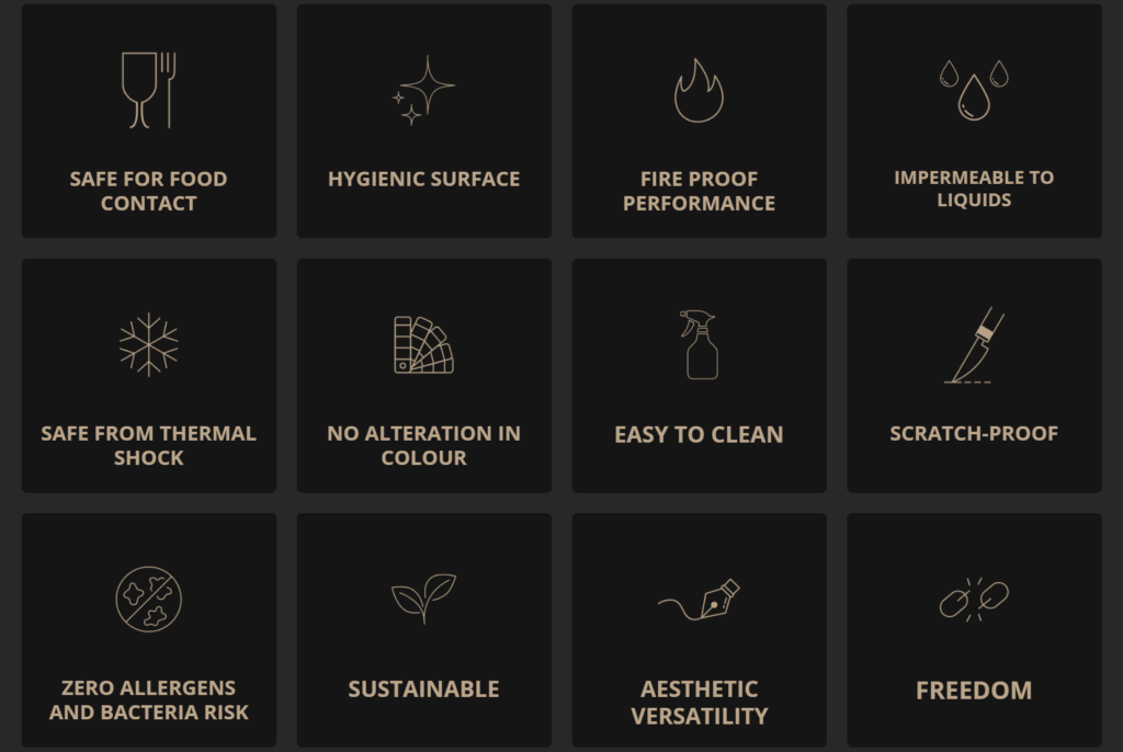 Twelve icons on a dark background, each representing a benefit of mineral surfaces: a fork and knife (safe for food contact), sparkles (hygienic surface), a flame (fireproof performance), water droplets (impermeable to liquids), a snowflake (safe from thermal shock), color swatches (no alteration in color), a spray bottle (easy to clean), a knife scratching a surface (scratch-proof), crossed-out germs and allergens (zero allergens and bacteria risk), a leaf (sustainable), an artist's pen (aesthetic versatility), and broken chains (freedom).
