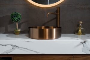 Sarasota porcelain countertop with a luxurious thick look, expertly crafted using a mitered edge around the sink.