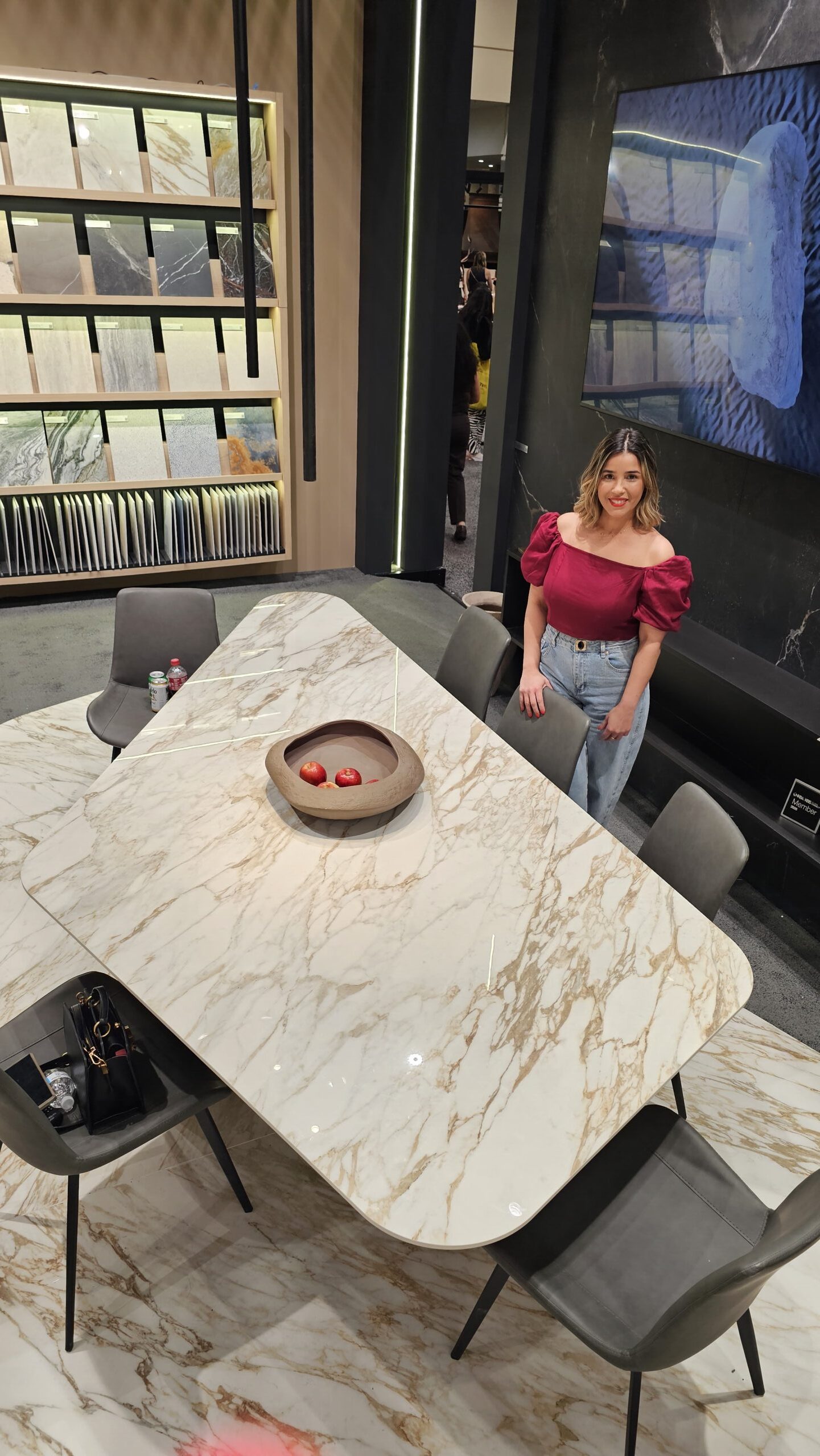 Lais Luz with an Infinity Surfaces porcelain slab dining table supplied by UMI Stone.